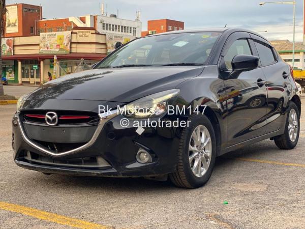 2016 - Mazda  Demio