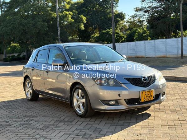 2004 - Mazda  axela