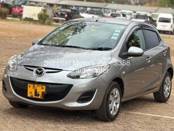 2011 - Mazda  Demio